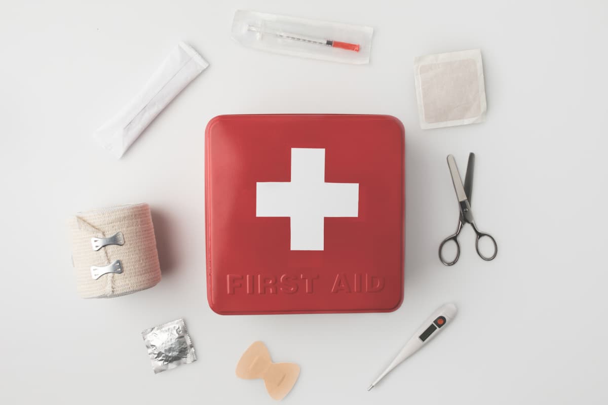 first aid kit laying on a desk