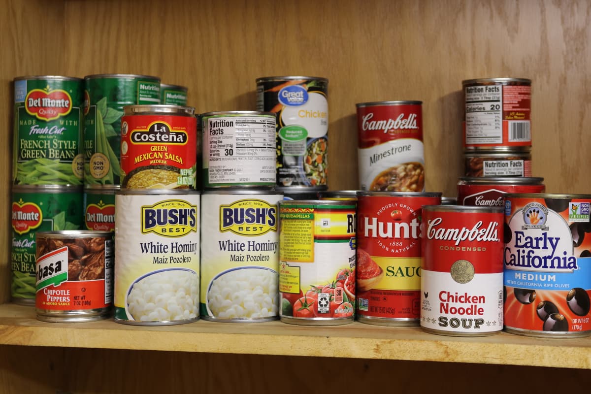canned food on a pantry shelf
